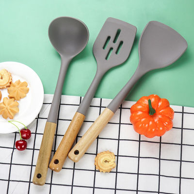 Cuisine en silicone Ensemble en trois pièces à la pelle résistante à la chaleur à l' adhésion à la cuillère à main en bois
