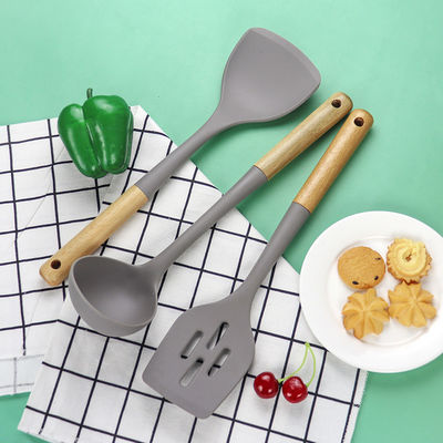 Cuisine en silicone Ensemble en trois pièces à la pelle résistante à la chaleur à l' adhésion à la cuillère à main en bois