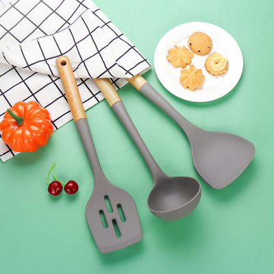Cuisine en silicone Ensemble en trois pièces à la pelle résistante à la chaleur à l' adhésion à la cuillère à main en bois